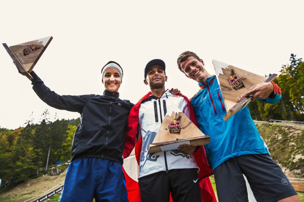 L-R) Second place winner Luka Kovacic (SLO), first place winner Ahmet Arslan (TUR) and third place winner Nejc Kuhar (SLO) celebrate at Red Bull 400 in Planica, Slovenia on September 19, 2015.